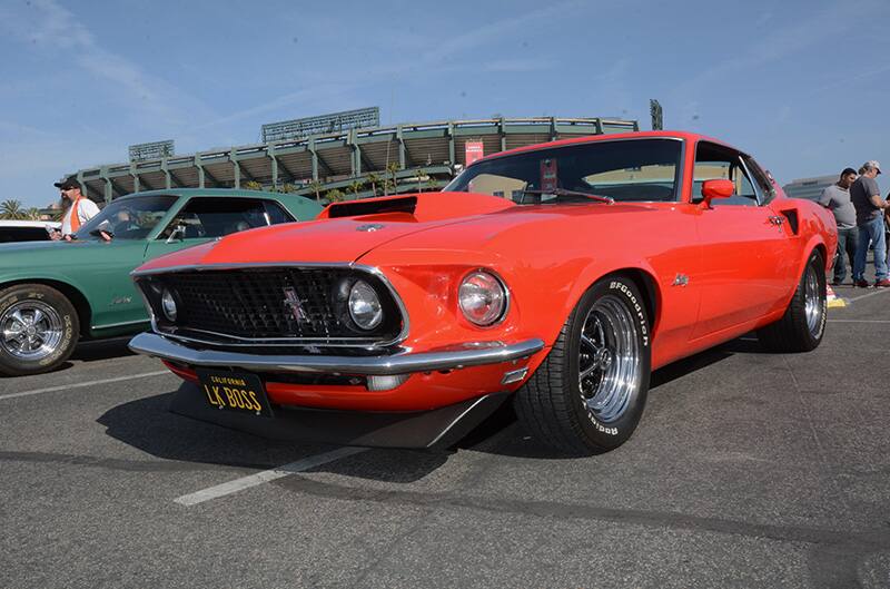 Front profile of red Mustang in parkng lot