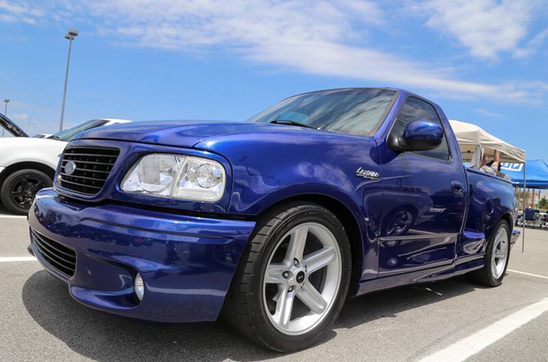 Front profile of blue SVT Lightning in parking lot