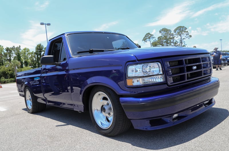 Front profile of blue SVT Lightning in parking lot