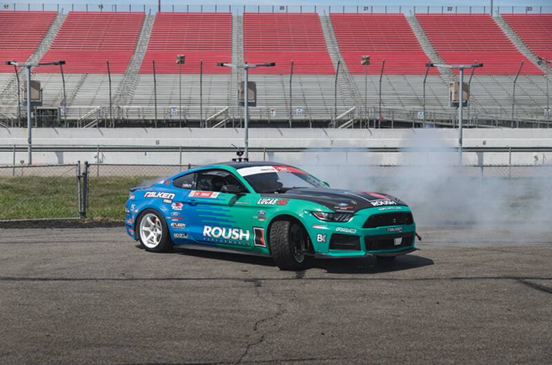 Front profile of Justin Pawlaks green and blue Mustang