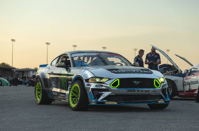 Front of Vaughn Gittin Jrs black Monster Energy Fun Haver Mustang in parking lot