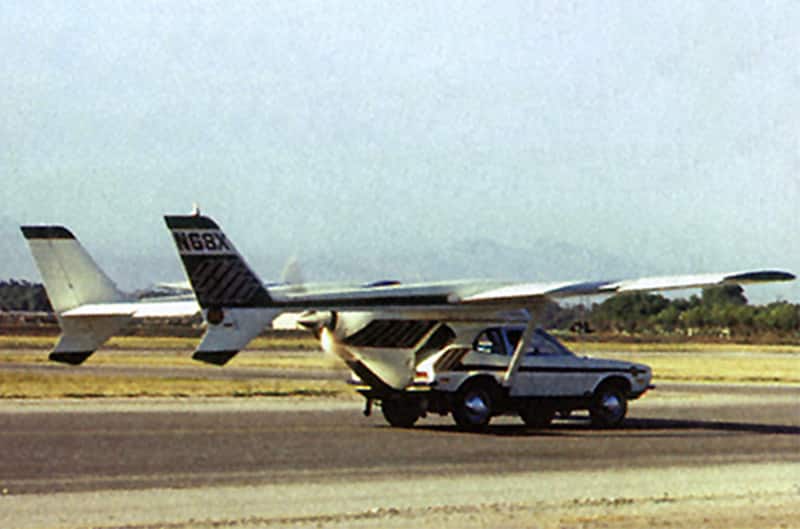 The white Galpinized Flying Ford Pinto on the runway