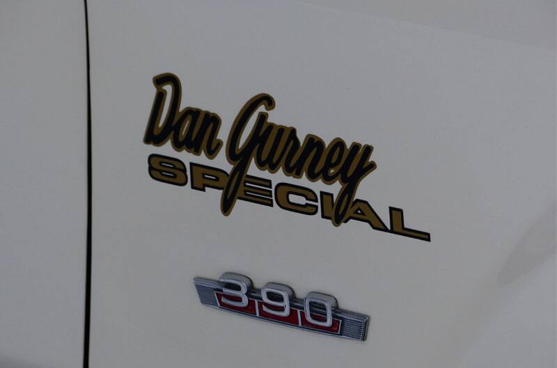 Close up of Dan Gurney Special painted on side of white car