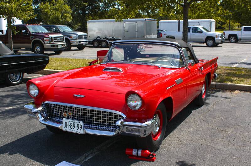 Front of red Thunderbird droptop in parking lot