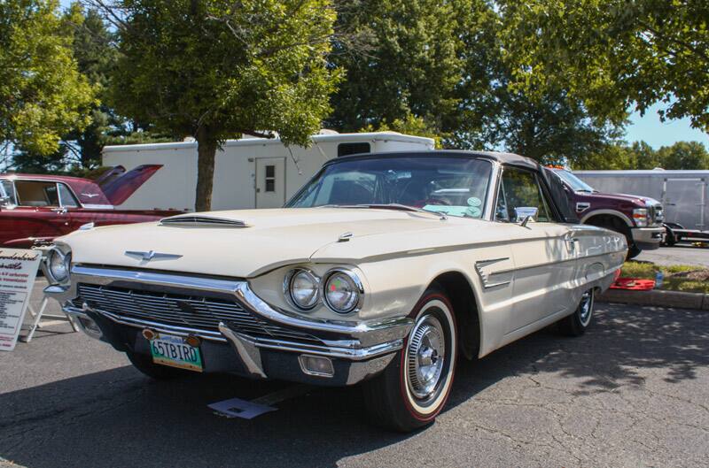 Front profile of white Thunderbird droptop in parking lot