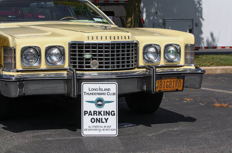 Front close up of a yellow Thunderbird Big Bird in parking lot