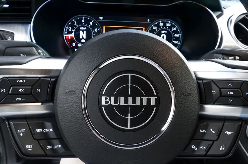 Close up of steering wheel with Bullitt in the center