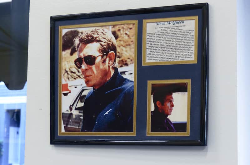 Steve McQueen picture and plaque hanging on a wall