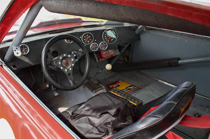 Interior shot driver side of front seat dashboard and steering wheel