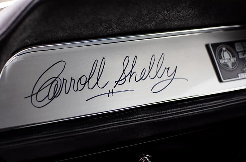 Close up of Carroll Shelby signature on dashboard