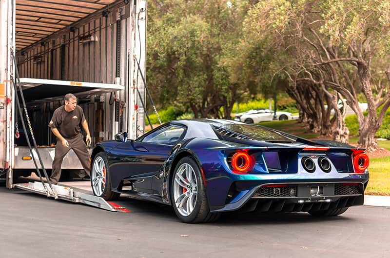 Rear profile of the Mystichrome GT being put onto a truck