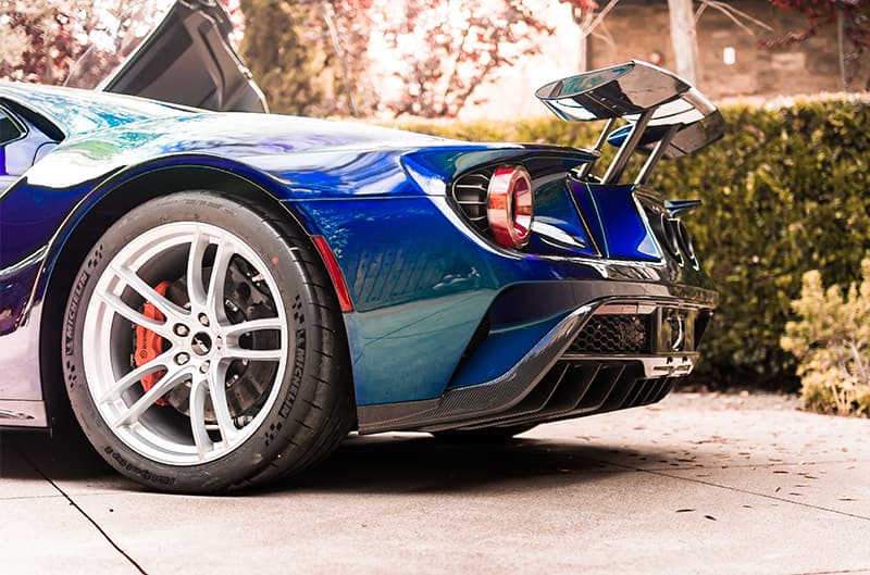 Close up rear side of the Mystichrome GT parked in driveway