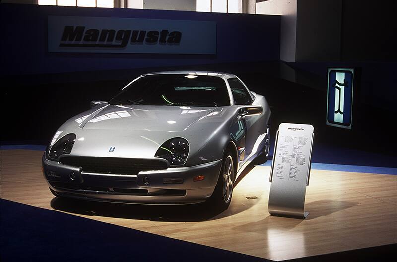 Front of a silver Mangusta Qvale V8 on display