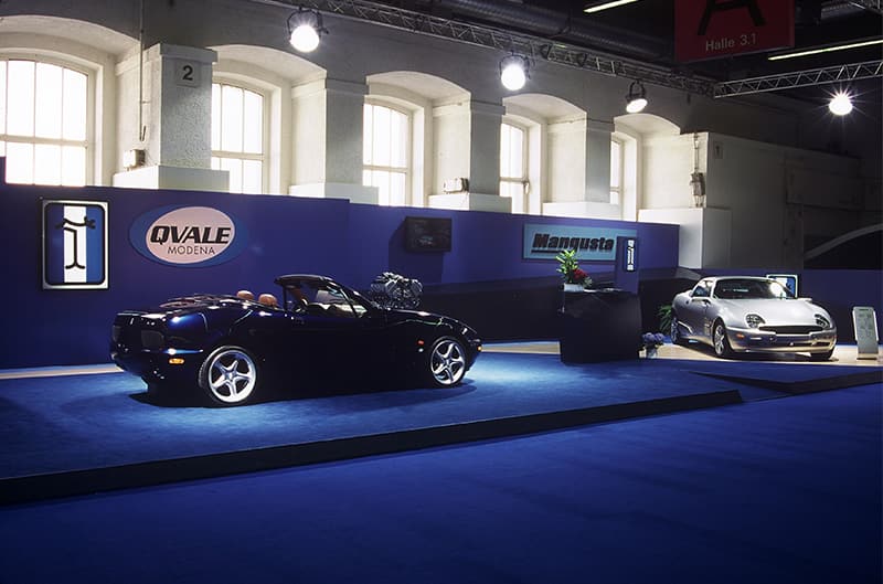 A black Qvale Mangusta and silver Mangusta Cobra V8 on display