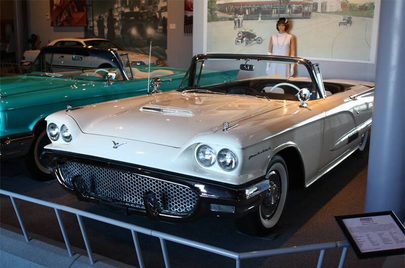 Front of white Thunderbird droptop with roof down on display