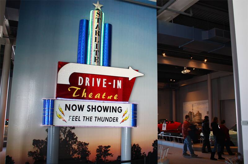 Wall painting of the Drive in Theatre sign showing Feel the Thunder