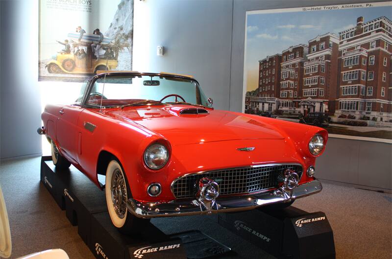 Front of red Thunderbird droptop with roof down on display