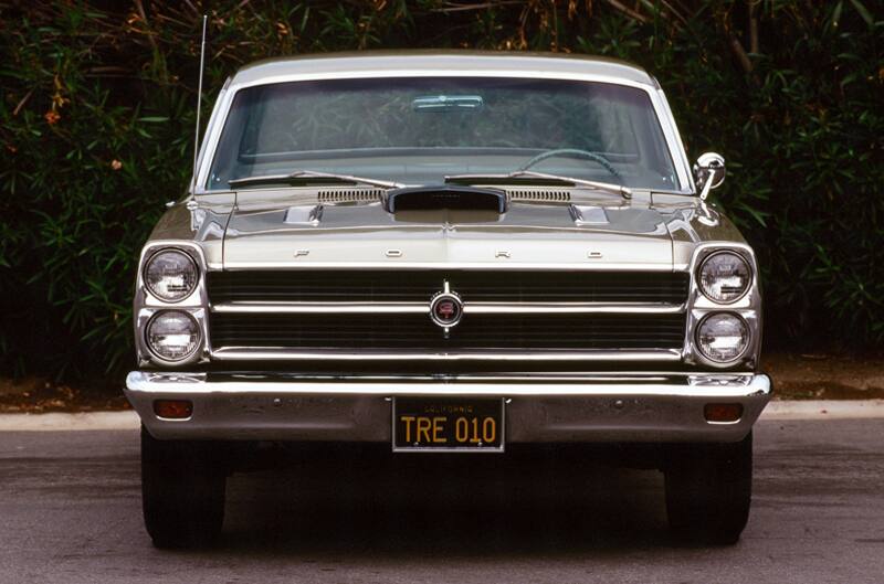 Front of white Fairlane GTA parked in lot