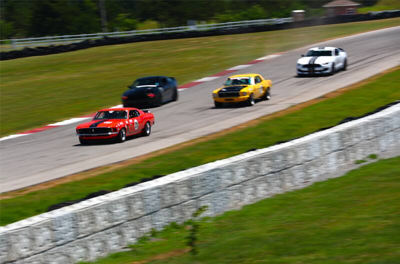 Ford Mustangs on Track at Hallet Raceway