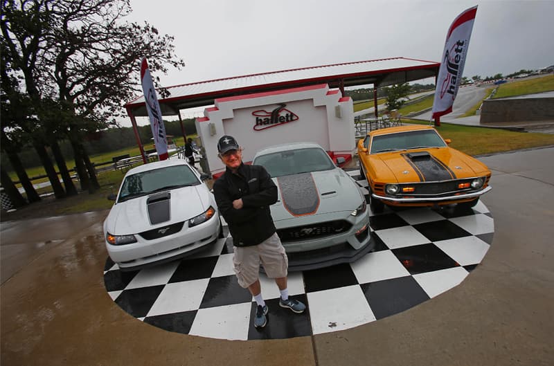 Ford Engineer Carl Widmann with Mach 1 Mustangs