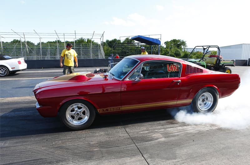 Red Mustang Burnout on DragStrip