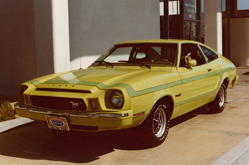 aged photo of Yellow Mustang II Major with blue stripes