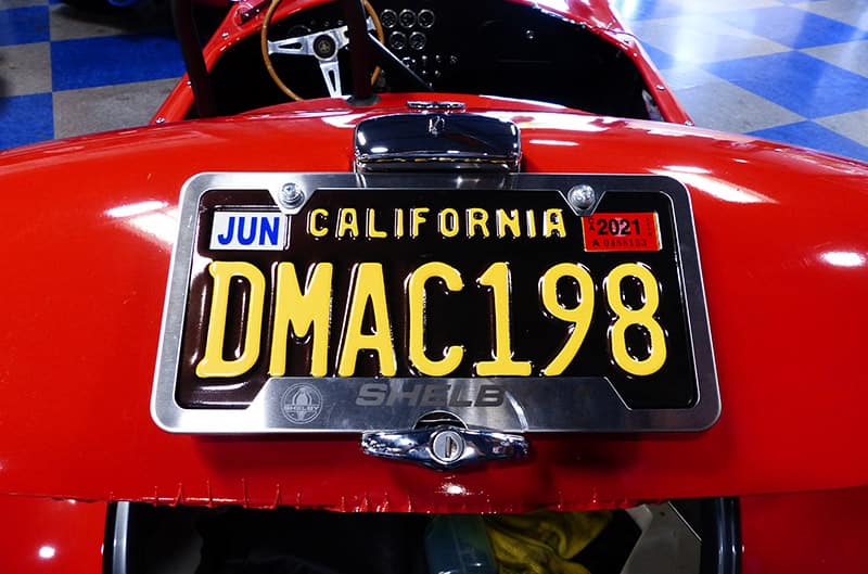 DMAC198 license plate on red shelby cobra