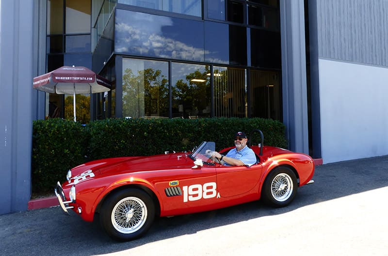 Matt Stone driving red shelby cobra