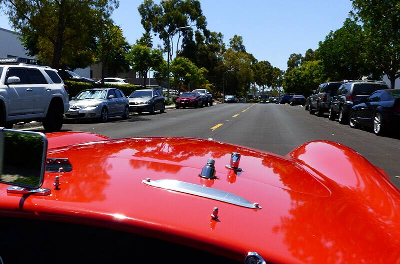 Matt Stone driving red shelby cobra 198