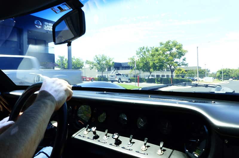 Matt Stone driving Black GT40 inside photo from passenger seat