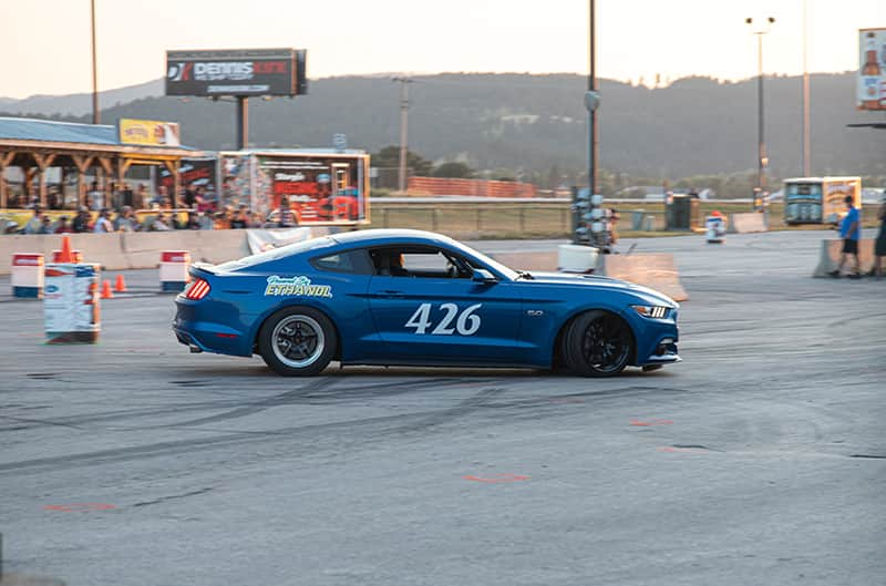 Blue 2018+ mustang in autocross