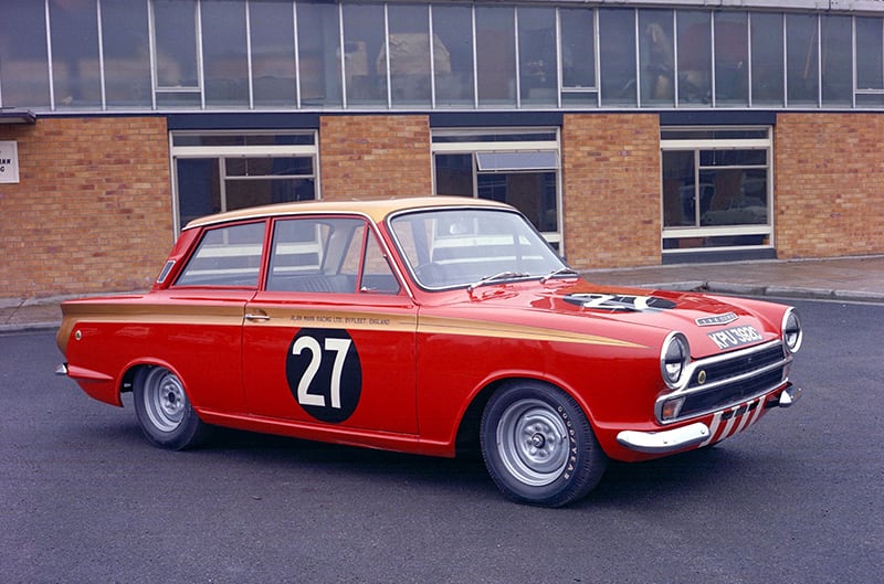 Red Lotus Cortina with 27 on passenger door