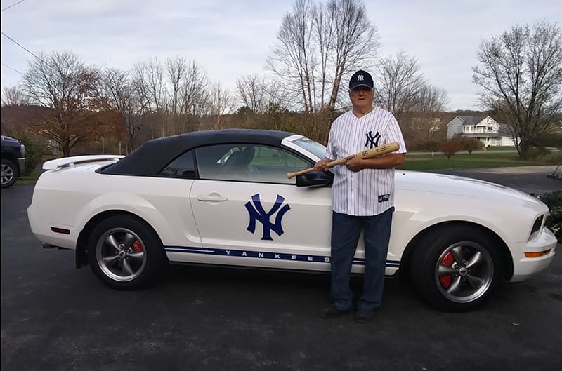 Walt standing with Mustang GT Yankee Edition