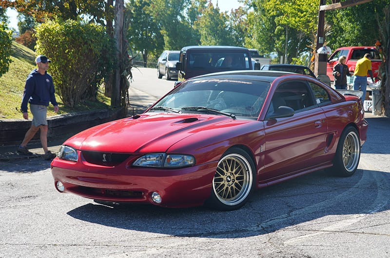 Red SN95 Mustang with Gold wheels