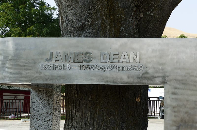 James dean memorial close up in front of tree