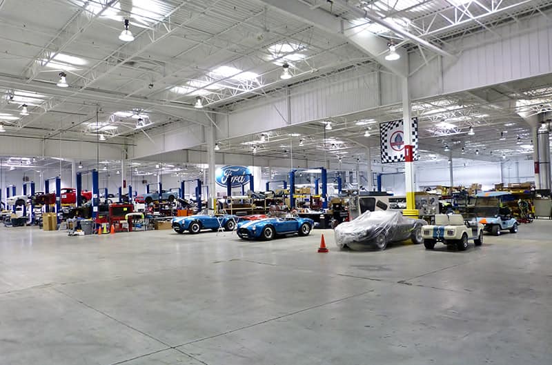 Interior of Shelby american with many shelby vehicles in production