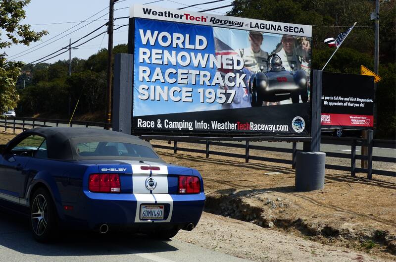 Leguna Seca raceway billboard reading world renowned racetrack since 1957