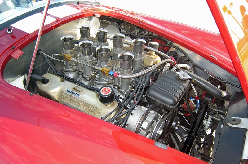 Engine bay photo with hood open from front