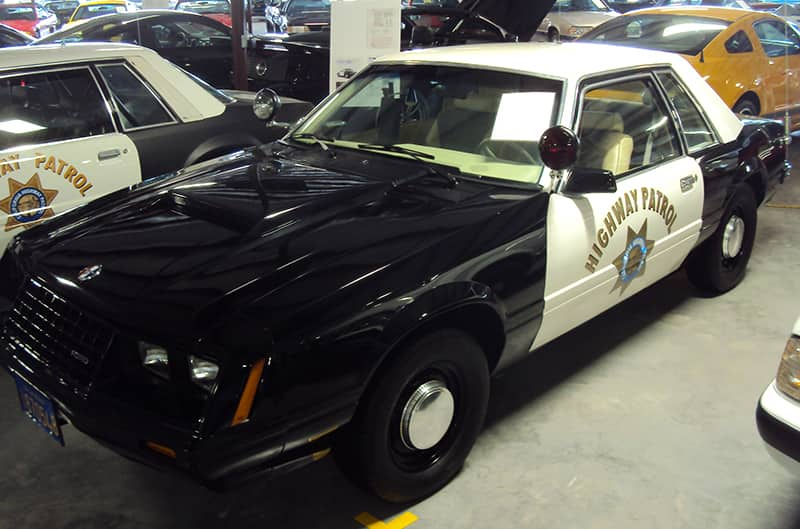 Black and white state patrol foxbody mustang