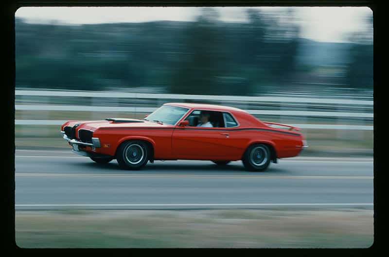 Cougar at speed from driver side.