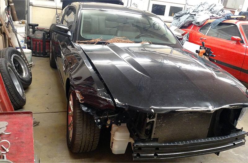 Leah's 2011 Mustang V6 in garage