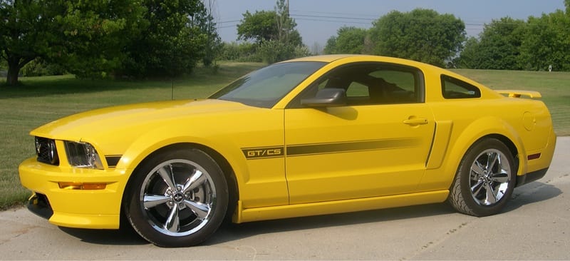 Yellow GT/CS mustang with black stripe