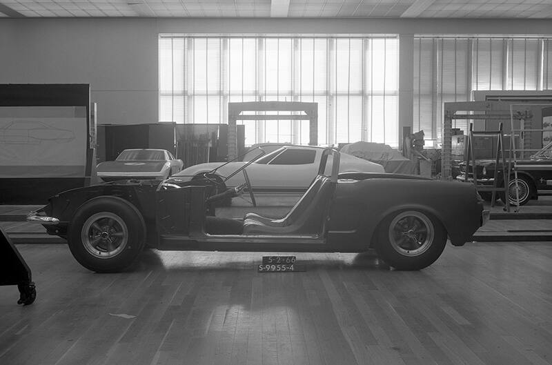 Side profile black and white photo of mustang chassis