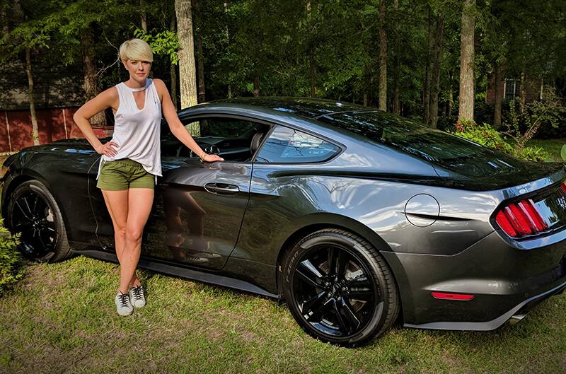 Megan with her 2017 mustang performance pack