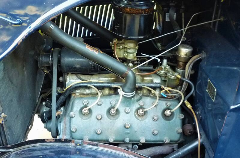 closeup of engine bay with Ford Flathead