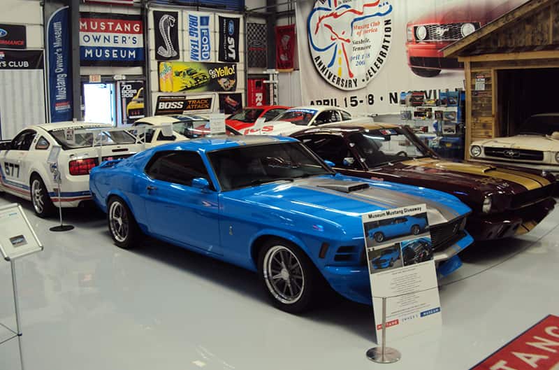 Mustangs inside museum include two second generation mustangs and one S197 Mustang