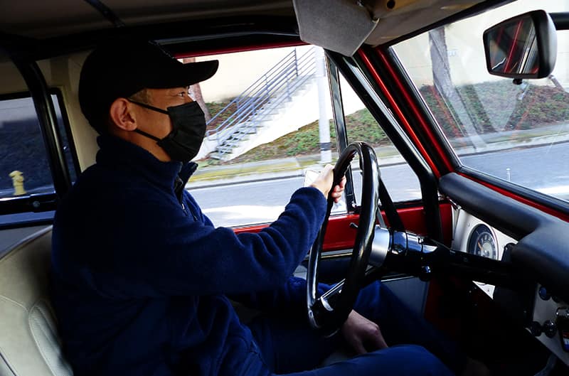 Tiger driving Stroppe Bronco with facemask on