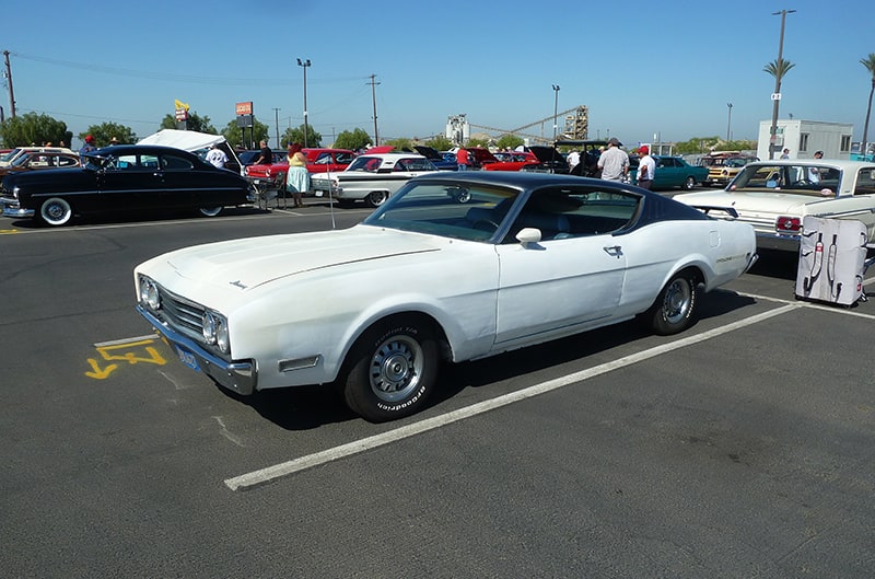 White Ford with Black top at car show