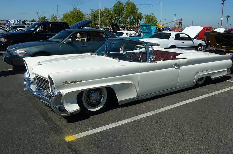 White Ford convertible at show