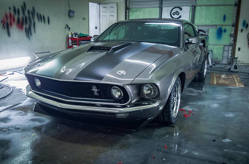 Gray Babayega Mustang inside shop